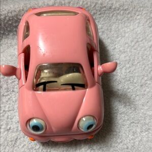 Adorable Pink Toy Car with Playful Eyes